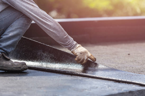 Professional Interior Drainage System technician working in Islandia, NY